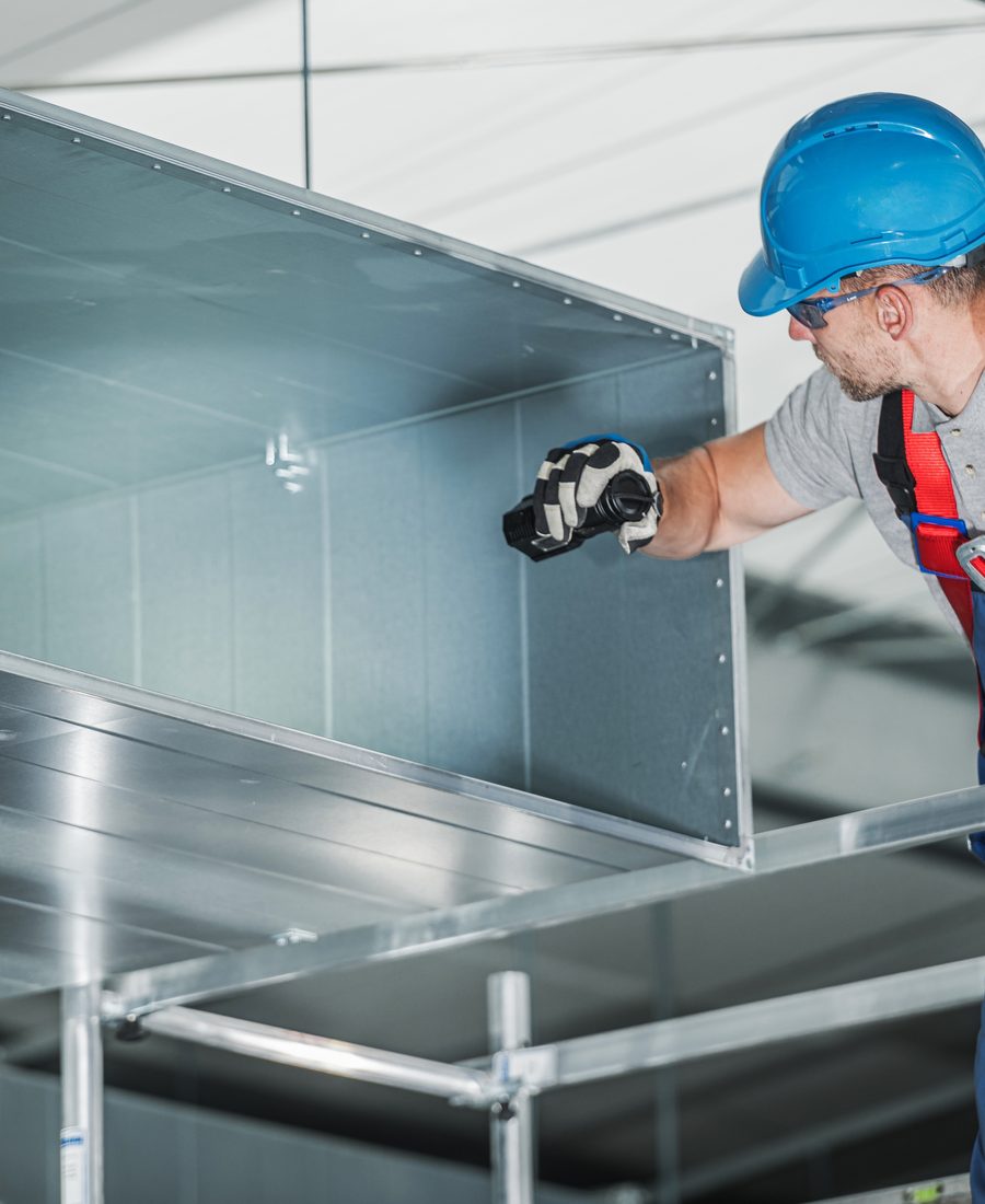 Traditional Air Conditioning technicians at work